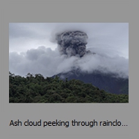 Ash cloud peeking through rainclouds
